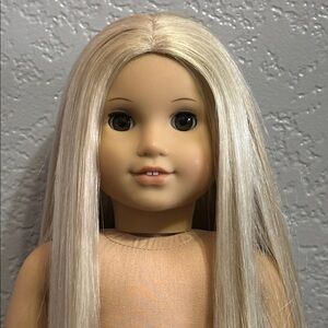 2014 American Girl Doll Blonde Hair Brown Eyes
Has a Flawed Eye